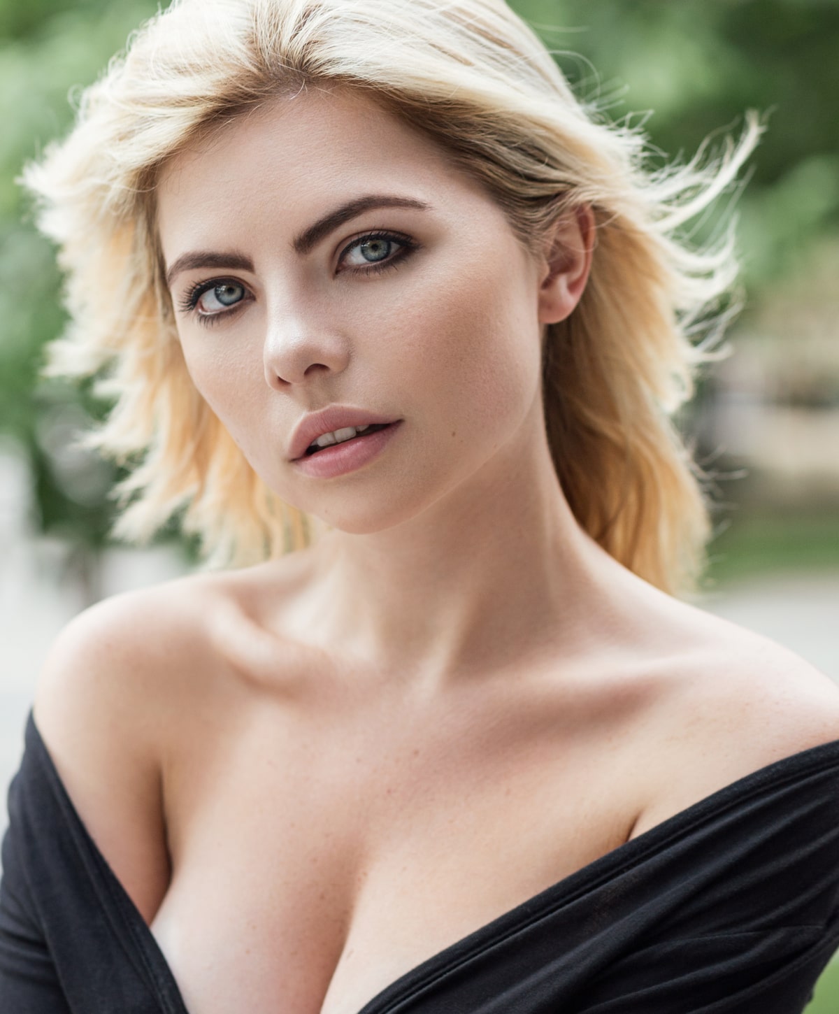 Kansas City transaxillary breast augmentation model with blonde hair